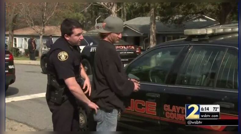 Police arrested and detained several people accused of running a chop shop. (Credit: Channel 2 Action News)