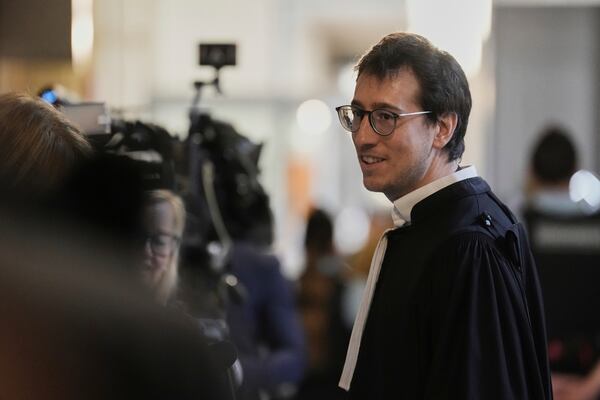Gabriel Dumenil, lawyer for one of the men accused in the 2016 armed robbery of Kim Kardashian, arrives at the palace of justice, Tuesday, May 13, 2025 in Paris. (AP Photo/Aurelien Morissard)