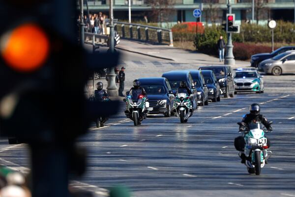 A motorcade of catafalques roll to attend a solemn farewell ceremony at Cathedral Square in Vilnius, Lithuania, Thursday, April 3, 2025 for the US soldiers who died during training exercise. (AP Photo/Mindaugas Kulbis)