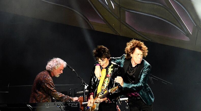 Chuck Leavell (from left) performs keyboards onstage with Ron Wood and Mick Jagger of the Rolling Stones. (Rick Diamond / Getty Images)