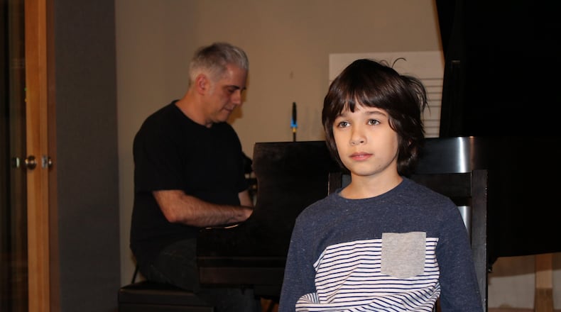 Dylan Beato, 9, has perfect pitch, meaning he can identify notes without hearing a reference note first. This is a rare ability and only about one in 10,000 possess it. (Cam Gaskins/Special to the AJC)