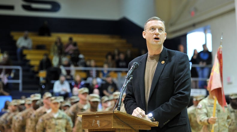 U.S. Rep. Doug Collins welcomes the troops with the 1-214th Field Artillery Battalion in 2014 from nearly a year in Afghanistan. HYOSUB SHIN / HSHIN@AJC.COM