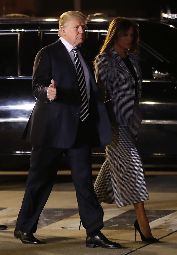 President Donald Trump  and First Lady, Melania Trump walk to greet the three Americans just released from North Korea, Kim Dong Chul, Kim Hak-song and Tony Kim, on May 9, 2018 in Maryland.