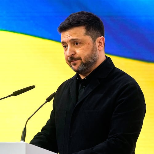Ukraine's President Volodymyr Zelenskyy addresses the audience during a session at the Munich Security Conference in Munich, Germany, Saturday, Feb. 14, 2026. (AP Photo/Michael Probst)