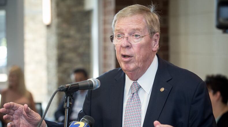 U.S. Senator Johnny Isakson speaks to the crowd at the reception for the newly completed first phase of construction of Walton High School in Marietta, GA Sunday, July 30, 2017. STEVE SCHAEFER / SPECIAL TO THE AJC