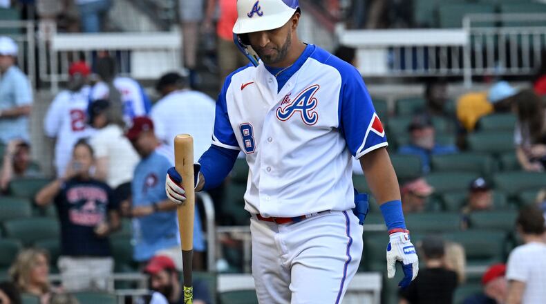 Braves' left fielder Eddie Rosario walks away after striking out on May 27, 2023, in Atlanta. (Hyosub Shin/The Atlanta Journal-Constitution)