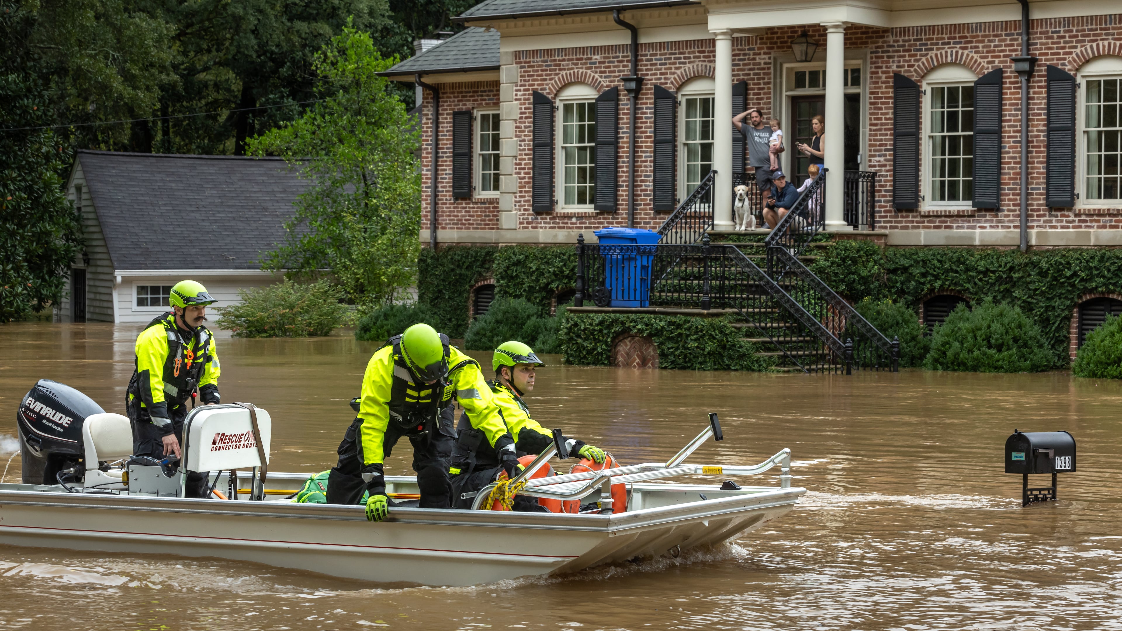 Helene, which entered Georgia as a Category 2 hurricane Friday morning, Sept. 27, 2024, and was later downgraded to a tropical storm, brought a lot of problems to Atlanta with numerous water rescues and incessant rain. Pictured: Atlanta Fire Rescue’s Dive/Swift Water Team performed welfare checks on residents on Hanover West Drive in Atlanta. All wanted to shelter in place. (John Spink/AJC)