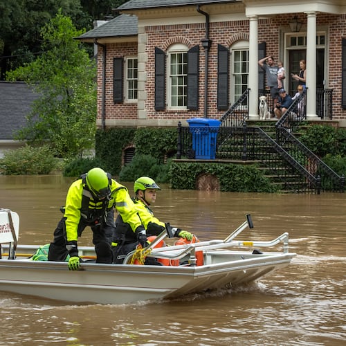 Atlanta Fire Rescue’s Dive/Swift Water Team performed welfare checks on residents on Hanover West Drive in Atlanta, after Helene entered Georgia as a Category 2 hurricane Sept. 27, 2024 and then was downgraded to a tropical storm. It brought a lot of problems to Atlanta with numerous water rescues and incessant rain. (John Spink/AJC)