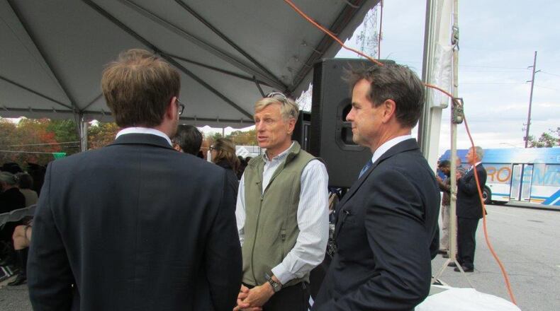 Columbia Ventures Managing Partner Dillon Baynes (right) chatting with Atlanta architect Jack Honderd (center) during the Nov. 2016, groundbreaking of the E.co East development in east Decatur. Baynes is still hoping City Schools Decatur will relocate its Early Childhood Learning Center within the project. Courtesy Greg White, city of Decatur