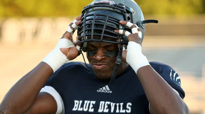 Norcross defensive end Lorenzo Carter, an AJC Super 11 selection in 2013, played with the Georgia Bulldogs, and is now a member of the Chicago Bears.