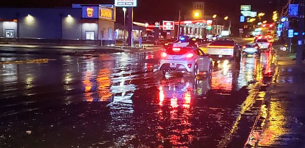 Floodwater covers a roadway off East Bethlehem Boulevard in Ohio County, W.Va., Thursday, June 26, 2025. (John McCabe/The Intelligencer via AP)