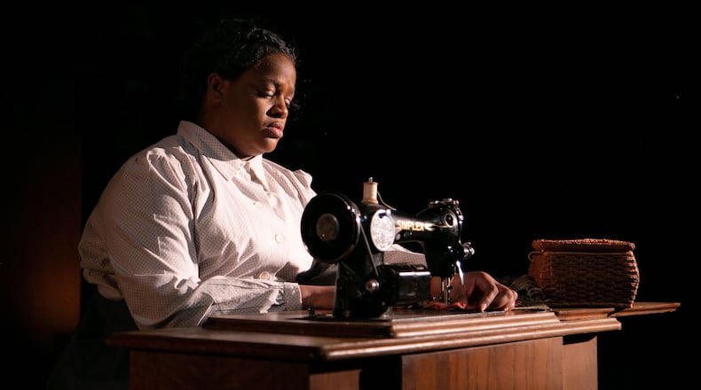 Vallea E. Woodbury appears in playwright Lynn Nottage’s “Intimate Apparel,” continuing through April 17 at Actor’s Express.