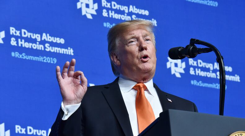 President Donald Trump speaks during the Rx Drug Abuse and Heroin Summit at the Hyatt Regency Hotel in downtown Atlanta on Wednesday. HYOSUB SHIN / HSHIN@AJC.COM