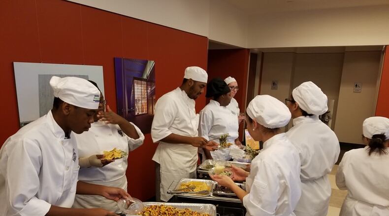 Smyrna government and businesses will provide paid part-time jobs to qualified Campbell High School students to help them graduate and excel. AJC file photo