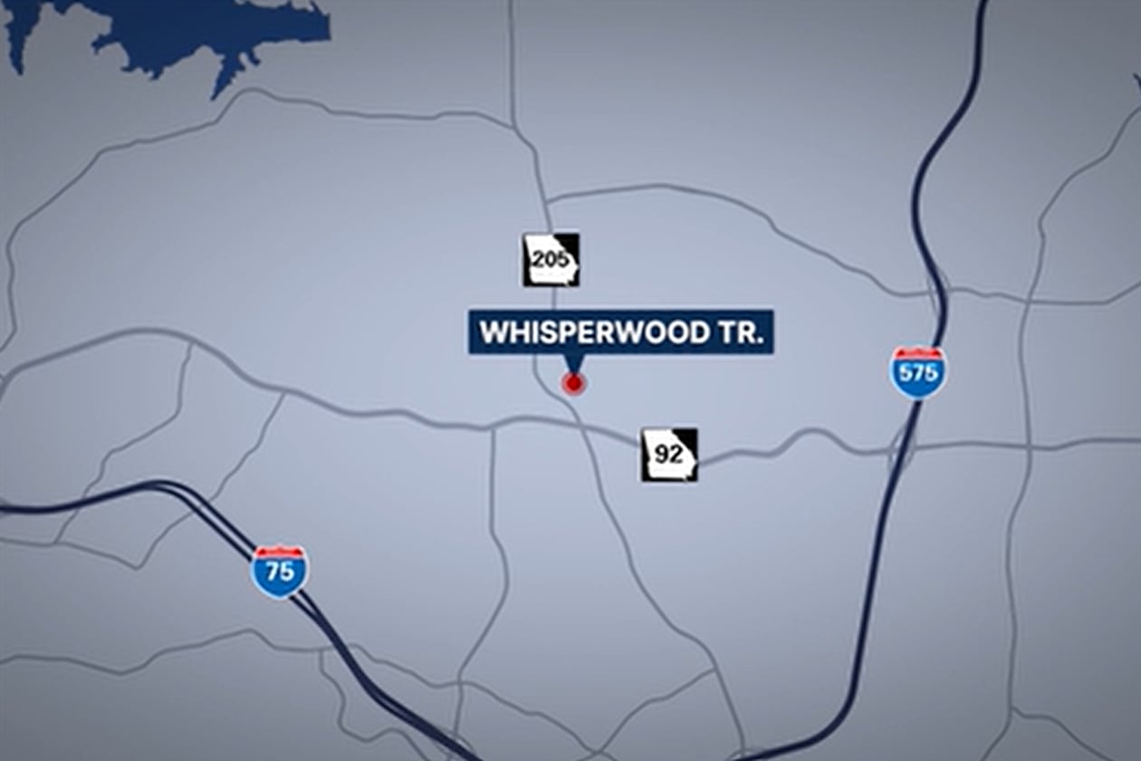 A man was killed by deputies at a home on Whisperwood Trail in Cherokee County, where his mother was found dead inside Saturday night, the sheriff's office said. (Courtesy of WSB-TV)