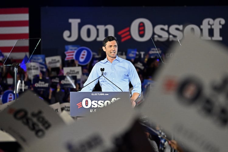 U.S. Sen. Jon Ossoff speaks during a rally at the Georgia International Convention Center in February. (Hyosub Shin/AJC)