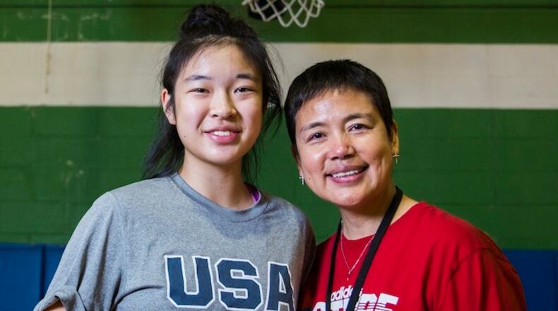 Plano West Senior High School basketball player Natalie Chou and her mother, Quanli Li, on January 13, 2016, at Q D Recreation Academy in Plano, Texas. (Ashley Landis/Dallas Morning News/TNS)