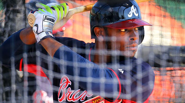 Braves left fielder Justin Upton will miss Wednesday's Grapefruit League opener against the Detroit Tigers with a sore right side.