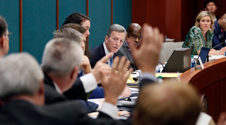 Senate Judiciary Chairman Jesse Stone counts votes during a hearing on a bill to prohibit convicted domestic abusers from possessing firearms. The bill passed the committee unanimously. Bob Andres, bandres@ajc.com