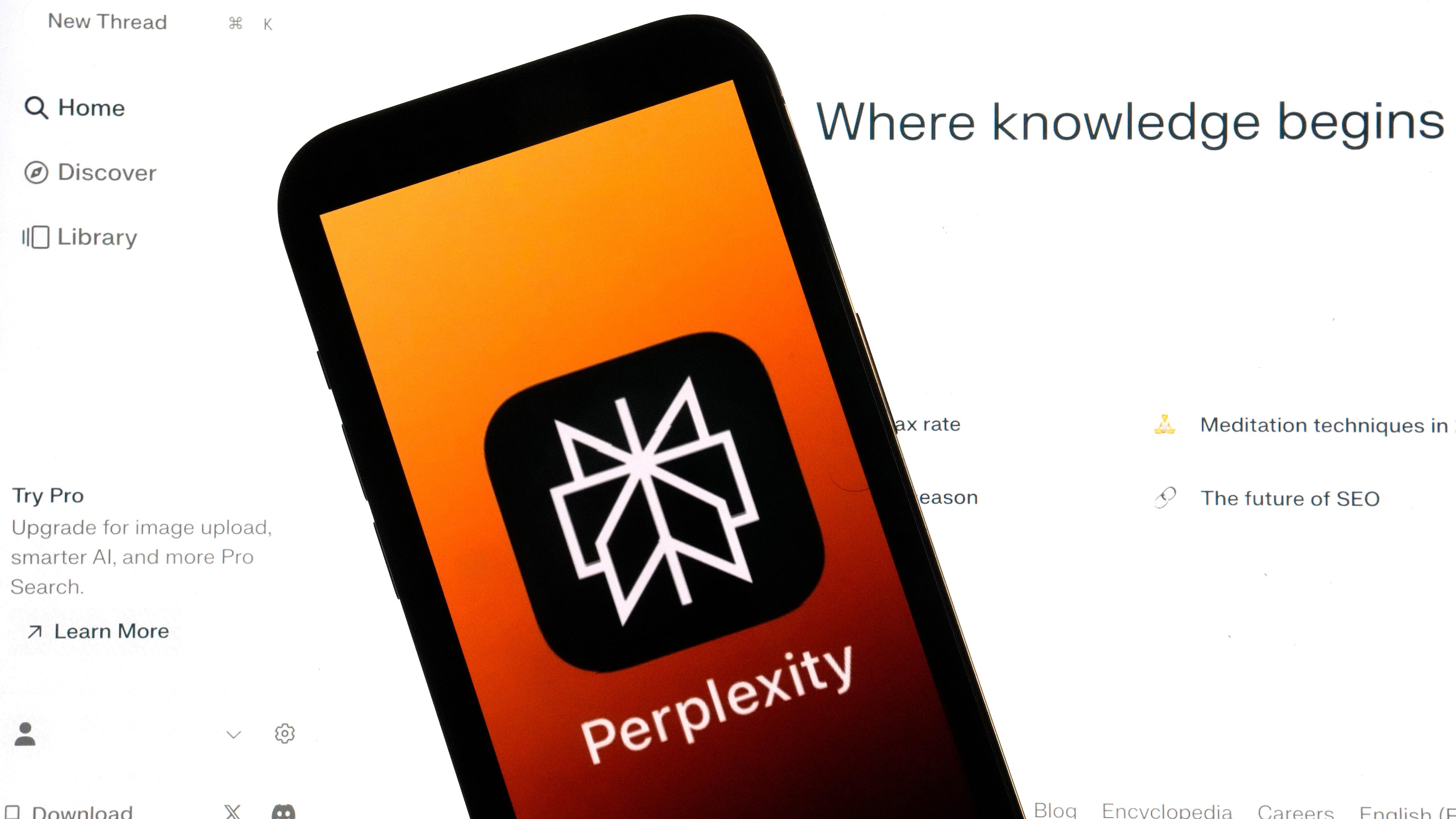 FILE - The Perplexity website and logo are shown in this photo, in New York, Friday, July 5, 2024. (AP Photo/Richard Drew, File)