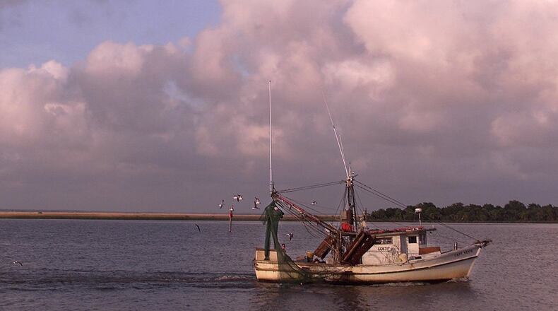 A shrimp boat on the Apalachicola River at sunset. (Paul J. Milette/The Palm Beach Post)