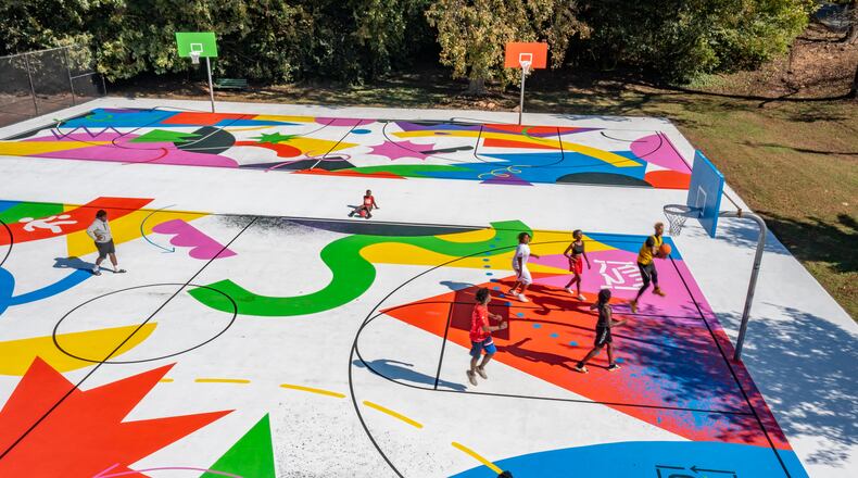 Basketball players shoot hoops on the Langford Park mural. Photo: Courtesy of SCAD