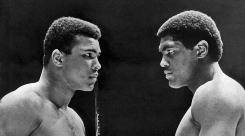Heavyweight champion Cassius Clay (left) focuses his whammy eye on challenger Ernie Terrell during the weigh in for the title fight, Houston, Texas, February 6, 1967. (Photo by Underwood Archives/Getty Images)