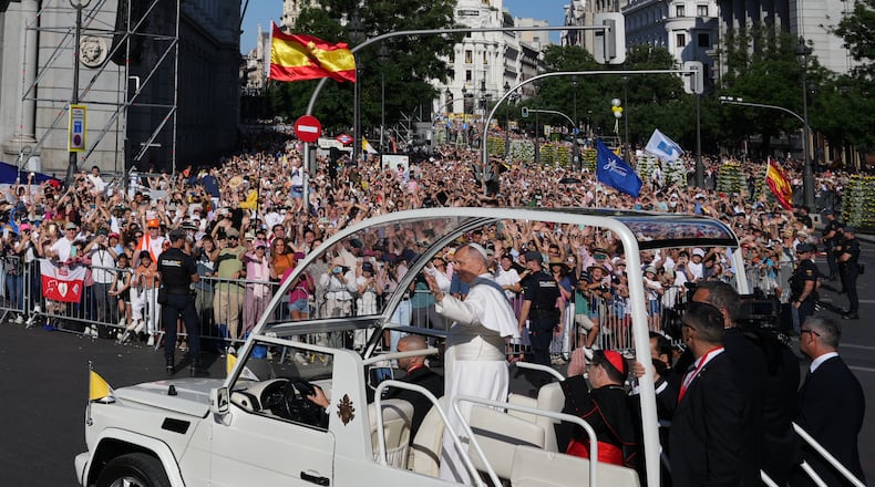 Pope Leo XIV arrives to preside over Mass marking the Catholic feast of Corpus Christi in Plaza de Cibeles in Madrid, Sunday, June 7, 2026, on the second day of a seven-day apostolic journey to mainland Spain and the Canary Islands. (AP Photo/Alessandra Tarantino)