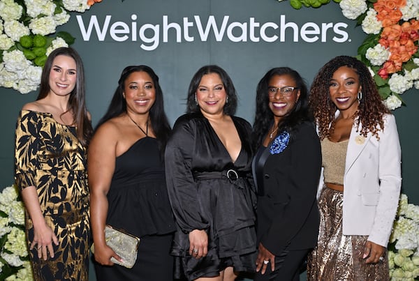 Dr. Michelle Cardel (from left), Amber Taylor, Meryl Lacy, Bridgetta McCloud, and NiTasha Woods attend a "Dinner With Bevy" event honoring Cynthia Bailey at the Thompson hotel in Atlanta on Wednesday. White/Getty Images for WeightWatchers