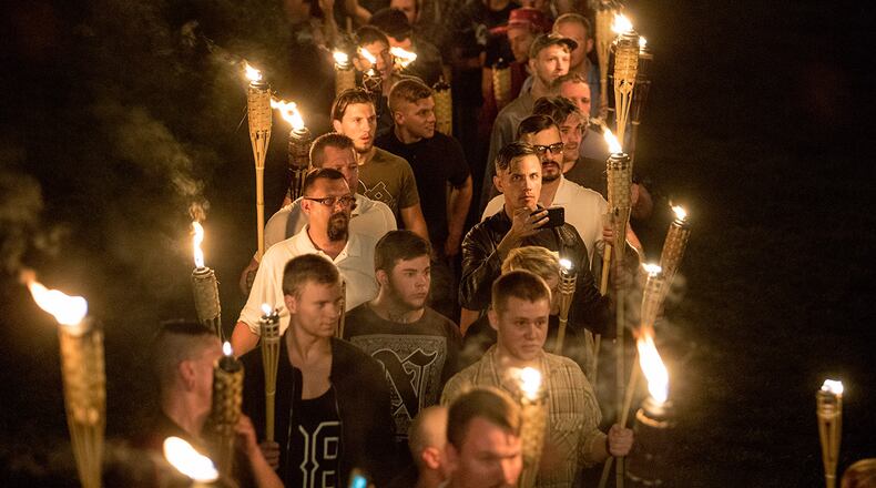 CHARLOTTESVILLE,VA-AUG11:Chanting White lives matter! You will not replace us! and Jews will not replace us! several hundred white nationalists and white supremacists carrying torches marched in a parade. (Photo by Evelyn Hockstein/For The Washington Post via Getty Images)