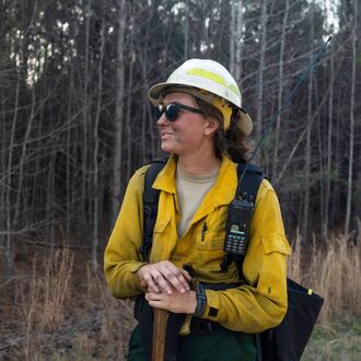 This photo provided by Holly Tuckett shows wildland firefighter Sydney Watson at the North Carolina WRTEX event near Singletary Lake, N.C., on Feb. 27, 2023. (Holly Tuckett via AP)