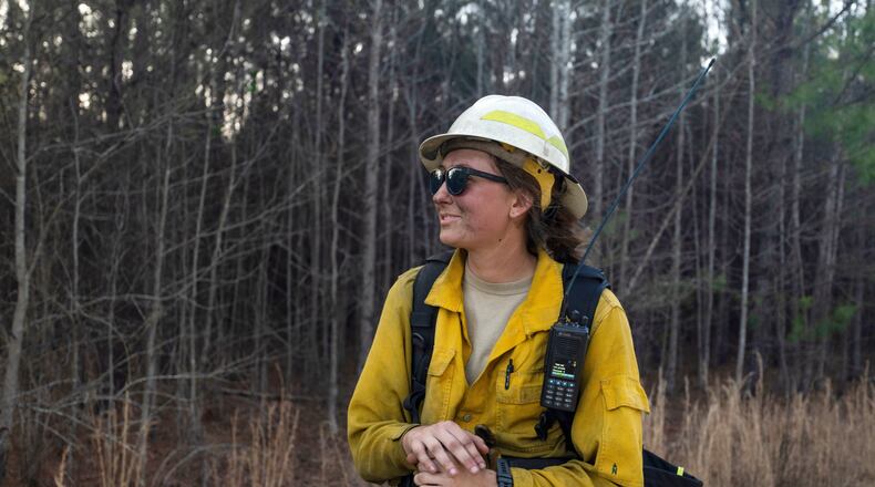 This photo provided by Holly Tuckett shows wildland firefighter Sydney Watson at the North Carolina WRTEX event near Singletary Lake, N.C., on Feb. 27, 2023. (Holly Tuckett via AP)