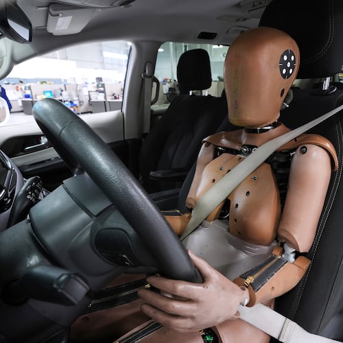 FILE - A THOR-5F female crash test dummy is shown in a driver's seat at Humanetics in Farmington Hills, Mich., June 10, 2025. (AP Photo/Paul Sancya, File)