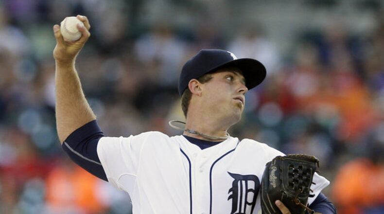 Former Georgia Tech ace Buck Farmer kept the Detroit Tigers in the game in his first major-league appearance Wednesday night. (Associated Press)