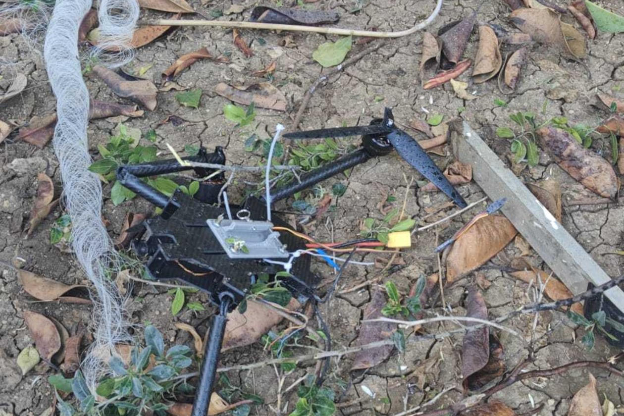 This photo provided by Zevik Glidai shows a fiber-optic drone surrounded by cables lying in the backyard of his home in Kiryat Shmona, Israel, after being brought over the border from Lebanon, Monday, April 13, 2026. (Zevik Glidai via AP)