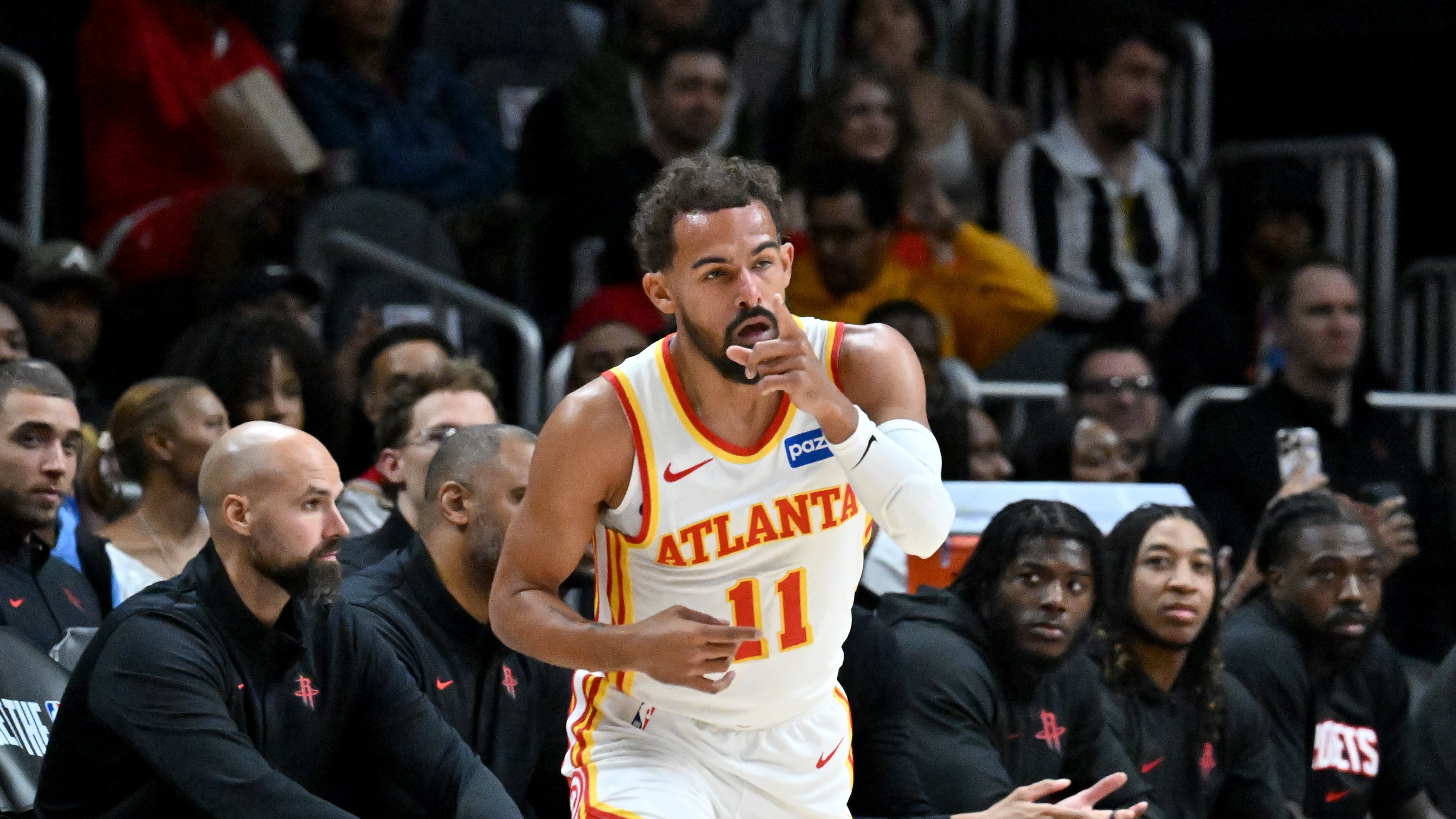 Atlanta Hawks guard Trae Young injured his knee Wednesday and is officially out for the Hawks' first NBA Cup game Friday against the Pacers. (Hyosub Shin/AJC)
