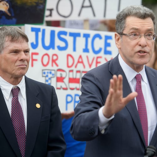 Former Olympic canoeist David Hearn, left, listens as his attorney Norman Eisen, right, speaks after he pleaded not guilty to allegedly damaging the Lincoln Memorial Reflecting Pool, Thursday, July 9, 2026, in Washington. (AP Photo/Rod Lamkey, Jr.)