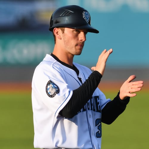 In this image provided by the Hudson Valley Renegades, Hudson Valley Renegades manager Blake Butera claps during a minor league baseball game in Wappingers Falls, N.Y., in 2019. (Roy Notaro/Hudson Valley Renegades via AP)