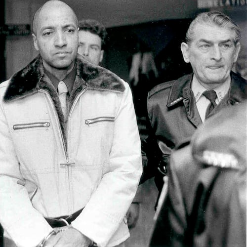 FILE - Convicted killer George Banks, center, is led through the Luzerne County, Pa. courthouse, on the way to his sentencing on Nov. 22, 1985. (Clark Van Orden/The Times Leader via AP, File)
