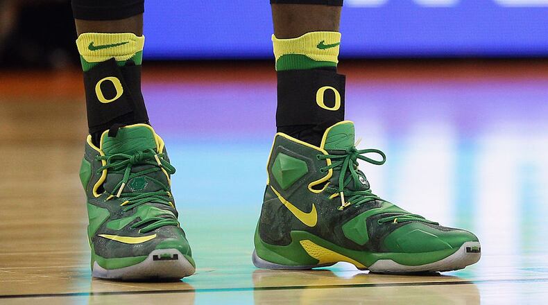 SPOKANE, WA - MARCH 18: Nike shoes are worn by a player on the Oregon Ducks as he takes on the Holy Cross Crusaders in the first half during the first round of the 2016 NCAA Men's Basketball Tournament at Spokane Veterans Memorial Arena on March 18, 2016 in Spokane, Washington. (Photo by Patrick Smith/Getty Images)