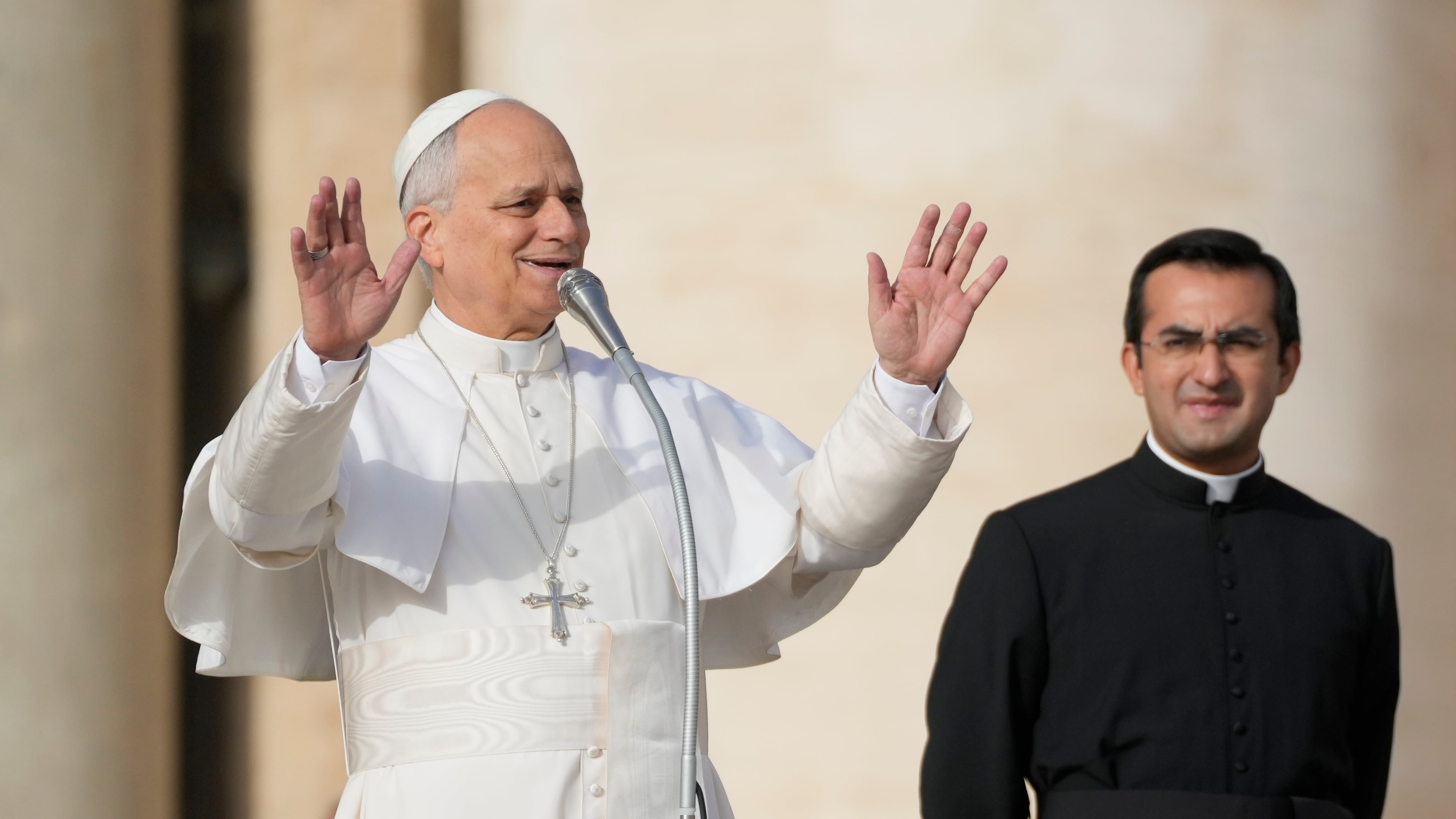 Pope Leo XIV waves to faithful before presiding over special mass for the Jubilee of the poor, in St. Peter's Square at The Vatican, Sunday, Nov.16, 2025. (AP Photo/Gregorio Borgia)