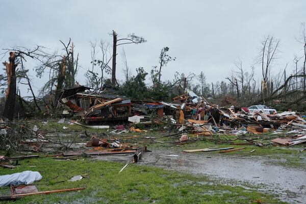 A Storm damaged home is seen Thursday, April 3, 2025, in Selmer, Tenn. (AP Photo/George Walker IV)