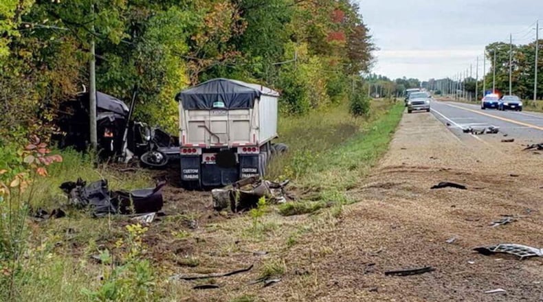 This Monday, Sept. 30, 2019 photo shows the aftermath of a fatal crash involving a car and a transport truck. Canadian police say the Jamaican musician and actor known as Louie Rankin died in the car crash involving a transport truck.