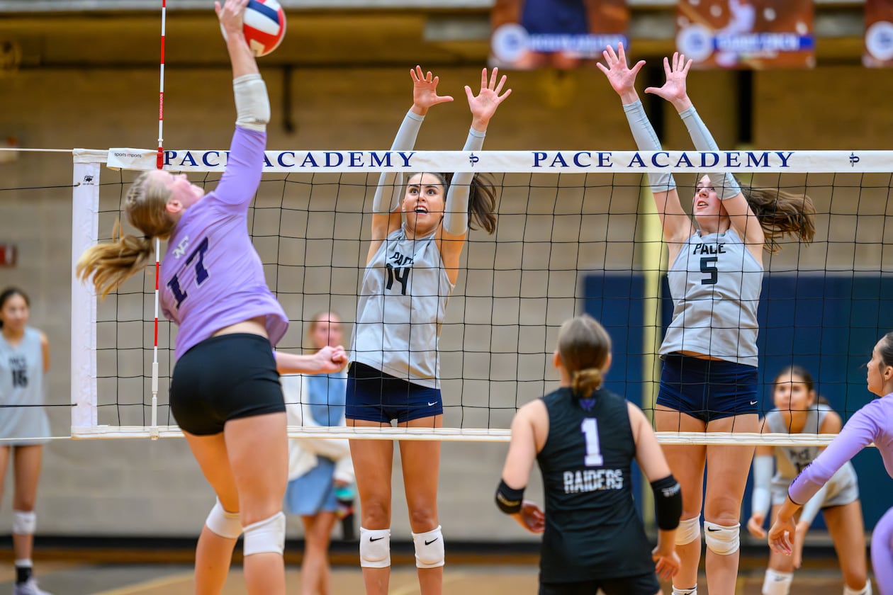 Olivia Siskin (center, on the far side of the net) and Jolie Litvak (right, on the far side of the net) defend a play at the net for Pace Academy, which is 35-7 heading into Thursday's state final against Marist in Cartersville. (Courtesy)