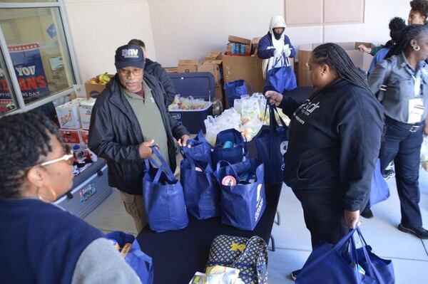 Goodr representatives hand out bags of free food to Disabled American Veterans members at Gwinnett County’s Veteran and Family Services Center in Lawrenceville on Nov. 4. (Photo Courtesy of Curt Yeomans)