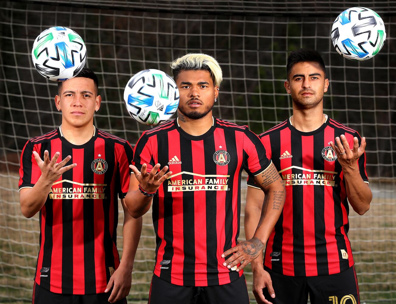 Feb. 5, 2020 Marietta: Atlanta United forward Ezequiel Barco (from left), forward Josef Martinez, and midfielder Pity Martinez pose for a portrait at the team training ground while preparing for the season opener on Wednesday, Feb. 5, 2020, in Marietta. Curtis Compton ccompton@ajc.com