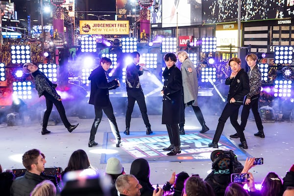 FILE - Members of BTS perform at the Times Square New Year's Eve celebration in New York on Dec. 31, 2019. (Photo by Ben Hider/Invision/AP, File)