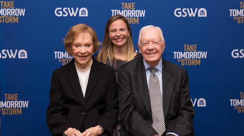 Archive photo of Dr. Jen Olsen (center), chief executive of the Rosalynn Carter Institute for Caregivers, with Rosalynn and Jimmy Carter. Courtesy of Rosalynn Carter Institute for Caregivers