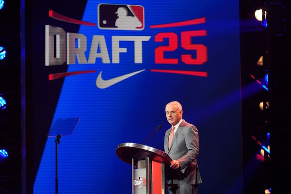 MLB Commissioner Rob Manfred speaks during the first round of the MLB baseball draft Sunday, July, 13, 2025 in Atlanta. (AP Photo/Mike Stewart)