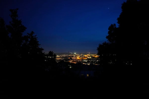 Stars can be seen in the sky above Lisbon, where most buildings had no lights during a nationwide power outage, Monday night, April 28, 2025. (AP Photo/Armando Franca)